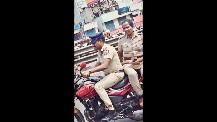 சாமானியனுக்கு ஒரு சட்டம்? போலீசுக்கு ஒரு சட்டமா? இன்சூரன்ஸ் இல்லாத வண்டியில் ஹெல்மெட் இன்றி பறந்த காவலர்கள்!