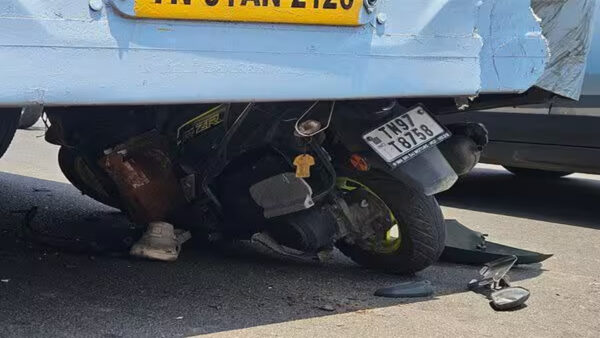 அரசு பேருந்தின் அடியில் சிக்கிய கூரியர் ஊழியர்!